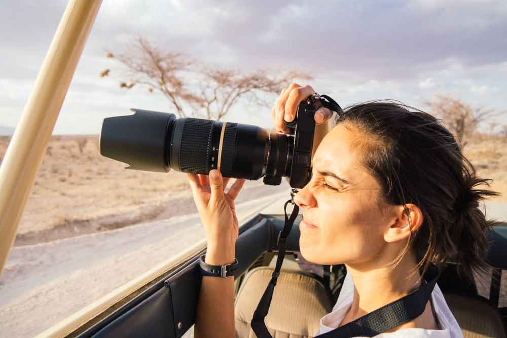 Take the longest lens you can afford